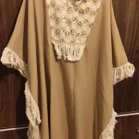 تعدای مانتو و پالتو