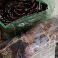 تعدادی وسیله( تابلو فرش، روفرشی، تلویزیون)
