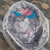 آغوشی نوزاد وبالشت