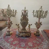ساعت و شمعدان برنجی