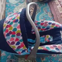 کریر و کیسه خواب نوزاد