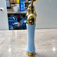 شیر روشویی رنگ طلایی با بدنه سنگ مرمر