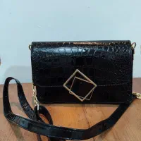 کیف مجلسی|کیف، کفش، کمربند|مشهد, پایگاه شکاری|دیوار