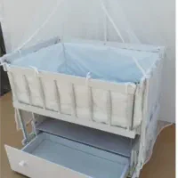 تخت گهواره کنار مادر