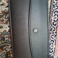 یک عدد کیف جای دسته چک