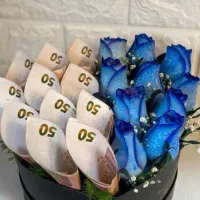 تزیین دسته گل پول هدیه ای ویژه برای روز مرد