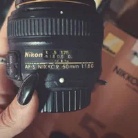 لنز نیکون nikon 50 f1/8 مشابه نو و تمیز