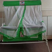 گهواره و روروئک نوزاد