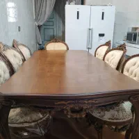 میز غذا خوری 8 نفره تمز در حد نو و....