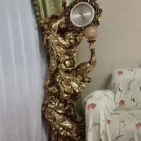 مجسمه دکوری هم ساعت هم چراغ وهم دکور