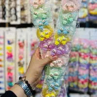 عروسک لبوبو و گیره مو
