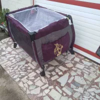 گهواره بچه فلزی