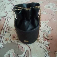 استوانه ای|کیف، کفش، کمربند|محمدیه-قزوین, |دیوار