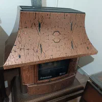 بخاری،ویترین،ساعت، زیر تلویزیون، ناهار خوری ۴ نفره