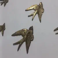 ۲۱ عدد پرستو دیوار کوب برنز