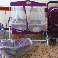 گهواره میلاد و کالسکه و نی نی لای لای