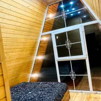 کلبه چوبی سوئیسی|اجارهٔ کوتاه‌مدت ویلا و باغ|بندر انزلی, گیلار|دیوار