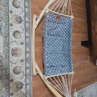 گهواره نوزاد چوبی و پارچه ای
