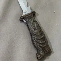 چاقوی کنده کاری شده