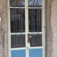 درو پنجره فلزی