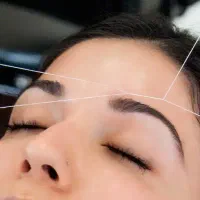 اصلاح صورت خانمها با بند و موخوره گیری با قیچی