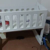 تخت گهواره ای نوزاد