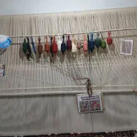 فرش چالشتر نصفه شده با کارگاه ومصالح.
