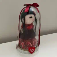 عروسک داخل شیشه