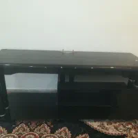 زیر تلویزیونی شیشه ای در حد نو