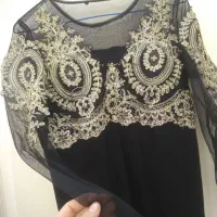 تونیک کشی مجلسی|لباس|قدس, شهرقدس|دیوار