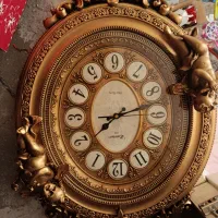 ساعت. .تابلو .مجسمه فرشته