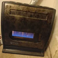 بخاری گازسوزجهان افروزودریچه کولر