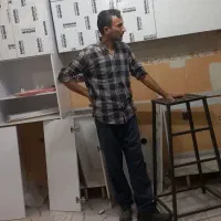 نصاب کابینت وکمد دیواری وتعمیرات