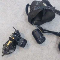 دوربین آنالوگ Canon EOS 3000 با دو لنز EF