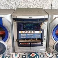 ضبط AIWA ژاپن سی دی و کاست خور بهمراه یک جفت باند