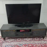 تلویزیون و میز تلویزیون و محافظ