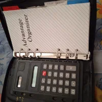 کیف چرم ماشین حساب خودکار دفتر یادداشت
