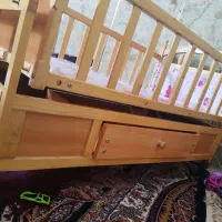 تخت گهواره ای نوزاد