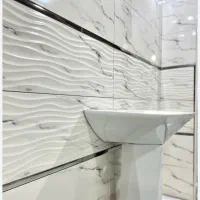 شاگرد کاشیکار میخام