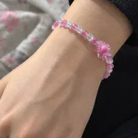 دستبند نگین دار صورتی و سفید
