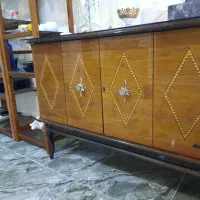 تلویزیون . چوب های گلف . صندوق عتیقه