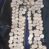 جلیقه قدیمی و پول کهن