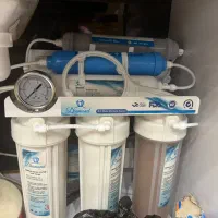 نصب وتعویض فیلتر دستگاه تصفیه آب خانگی