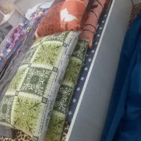 بالشت پر با روبالشی های نو دانه‌ای ۱۰۰