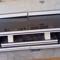 کولر آبی و بوفه و میز تلزیون و