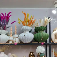 هفتسین دکوری گلدان جادستمال کاغذی گل ساعت