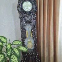 ساعت چوبی منبت کاری