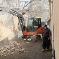 مینی بیل با خاکبرداری