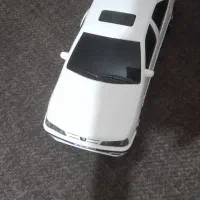 ماشین اسباب بازی همراه با آرمیچر و باتری و کلید