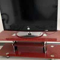 تلویزیون ال جی  ومیزتلویزیون شیشه ای